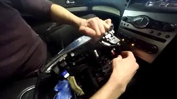 Nissan Skyline (2006-2013) - Disassembly of the center console of the car radio